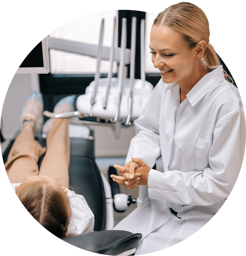 A pediatric dentist with a patient